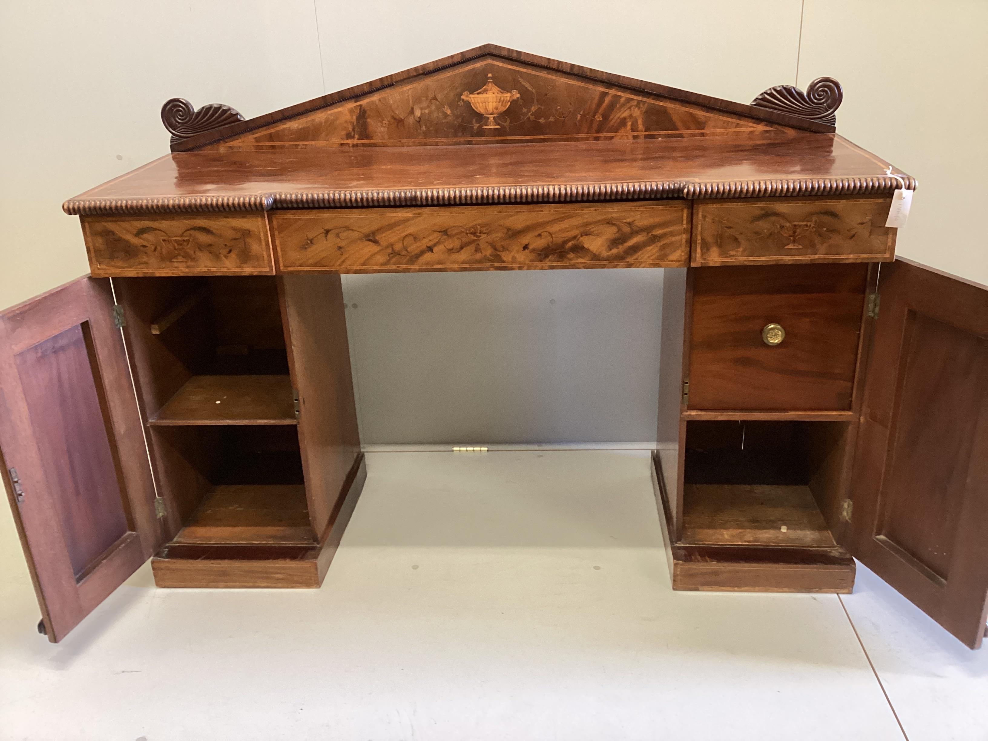 A William IV later marquetry inlaid mahogany pedestal sideboard, width 162cm, depth 54cm, height 126cm